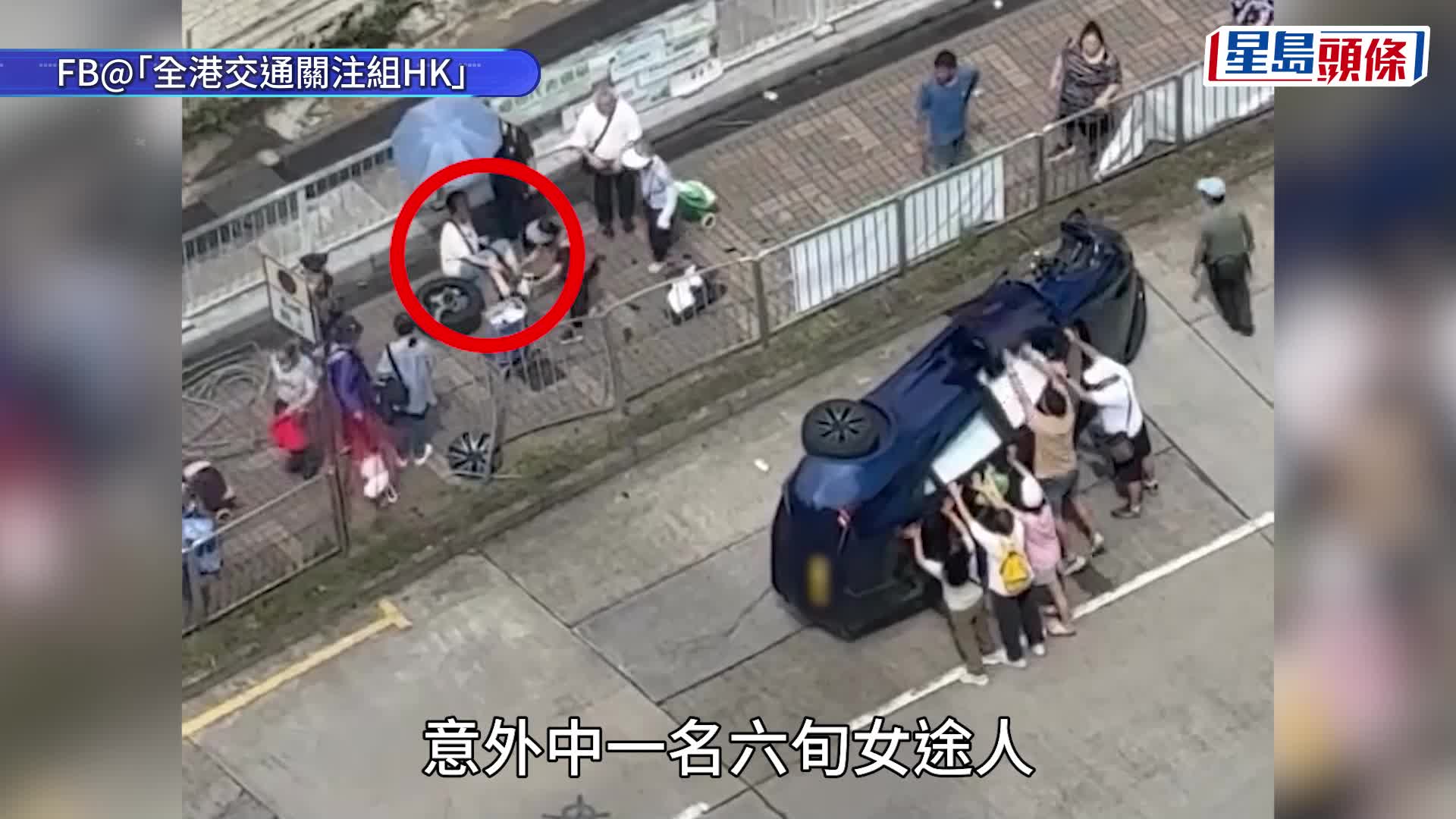 Tesla撞栏后翻侧，横亘在路上。杨伟亨摄 
