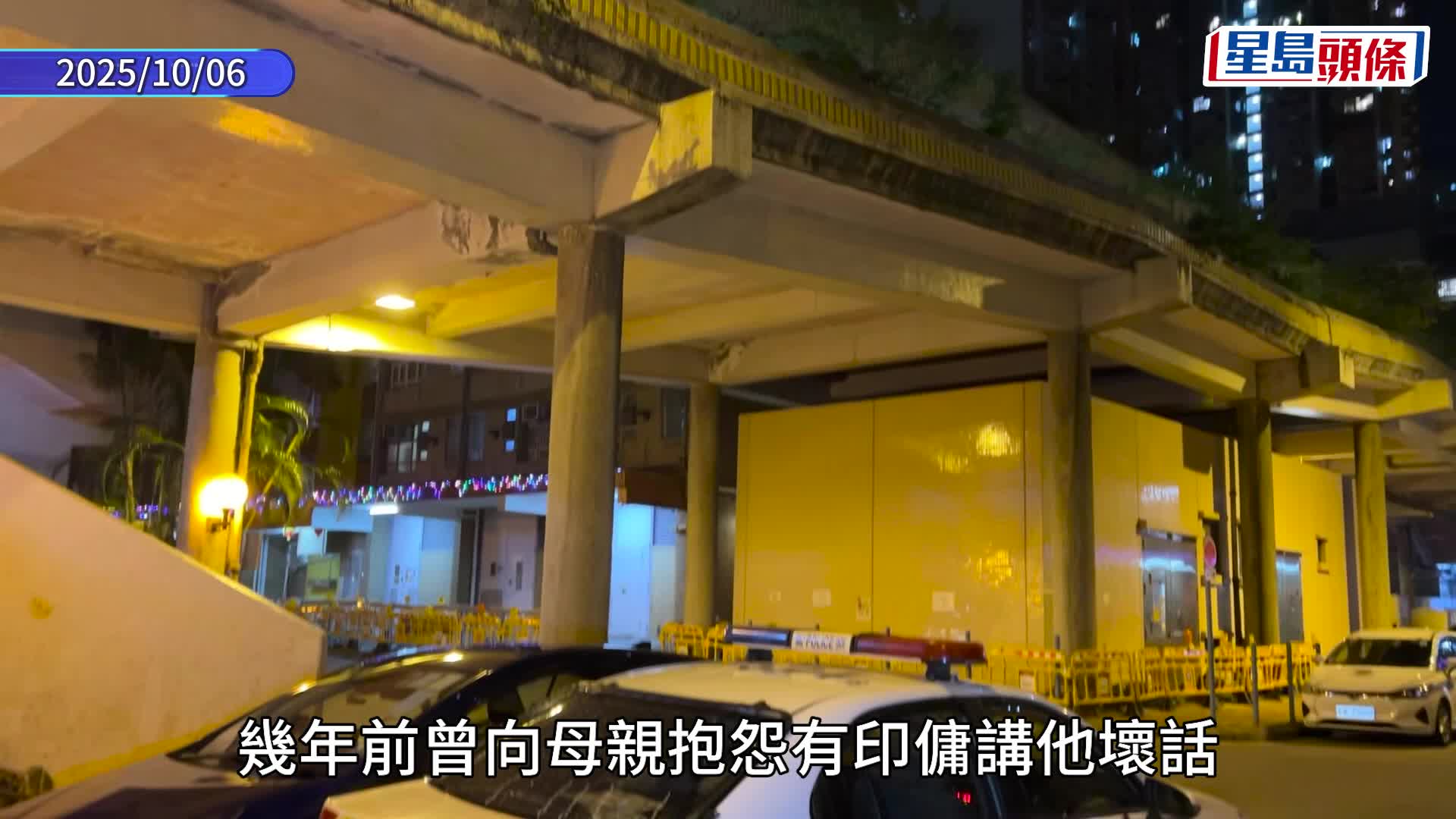 疑兇墮樓死亡，其家門外點有白蠟燭。林思明攝
