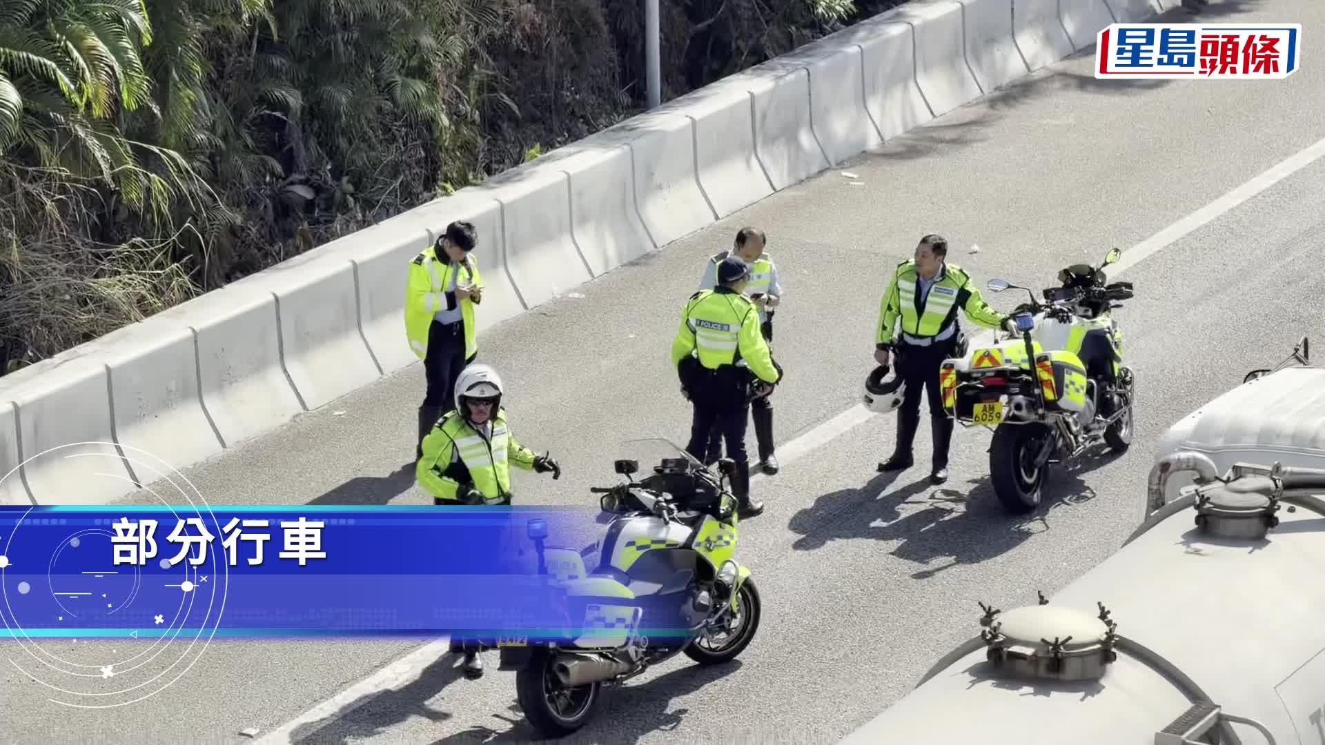 西九龍公路兩泥頭車相撞司機被困 往港島交通繁忙