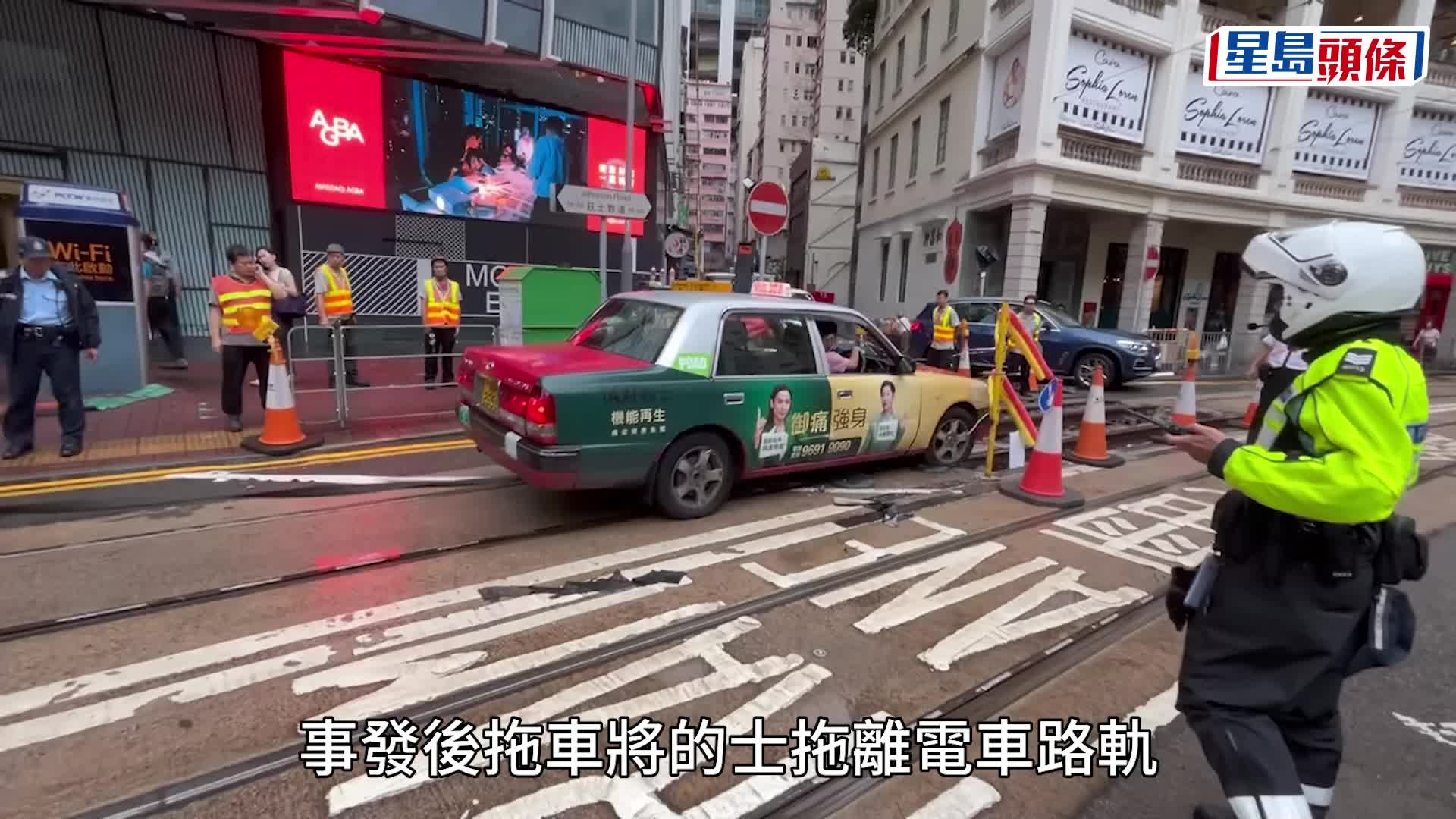 灣仔的士誤闖挖路工程範圍 墮電車路軌深坑受困
