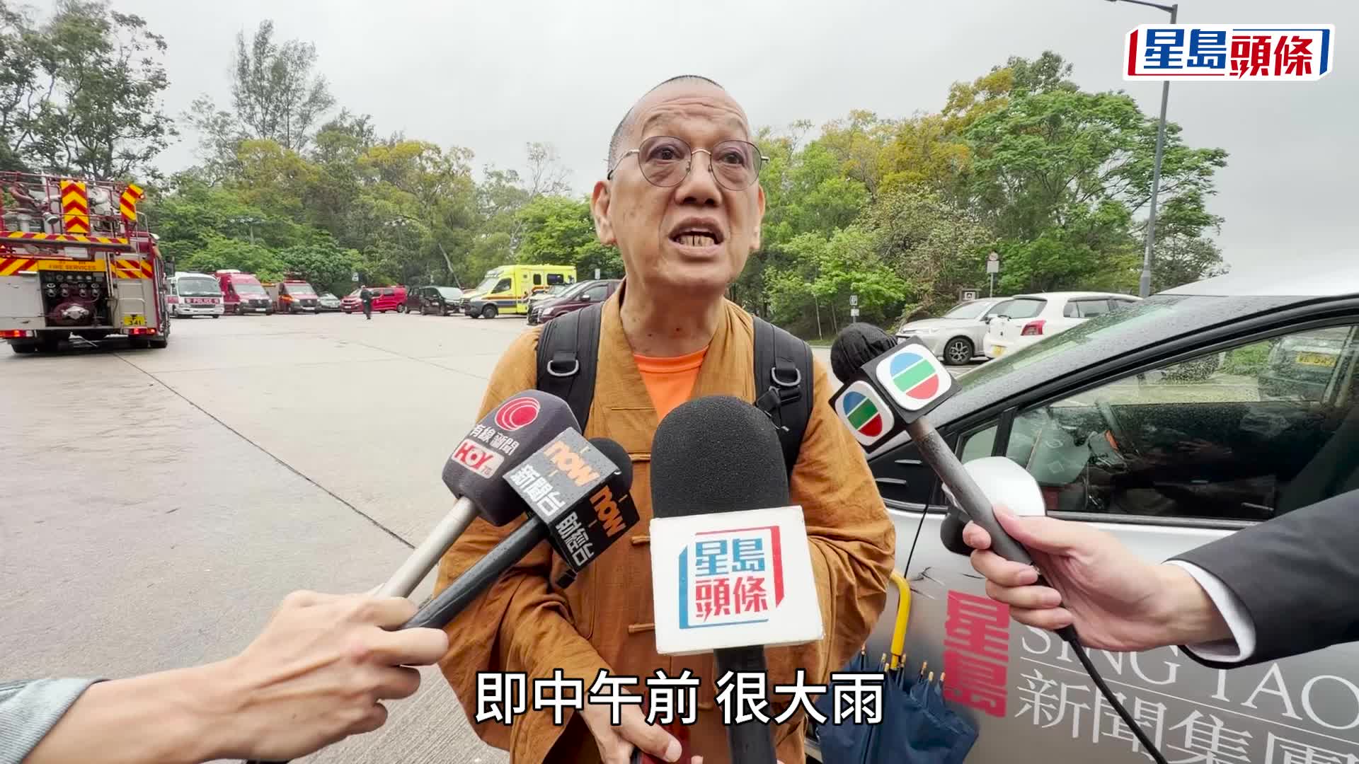 大师(圆图)在4日当日大雨期间曾遇见事主夫妇，指当时二人状态良好。梁国峰摄