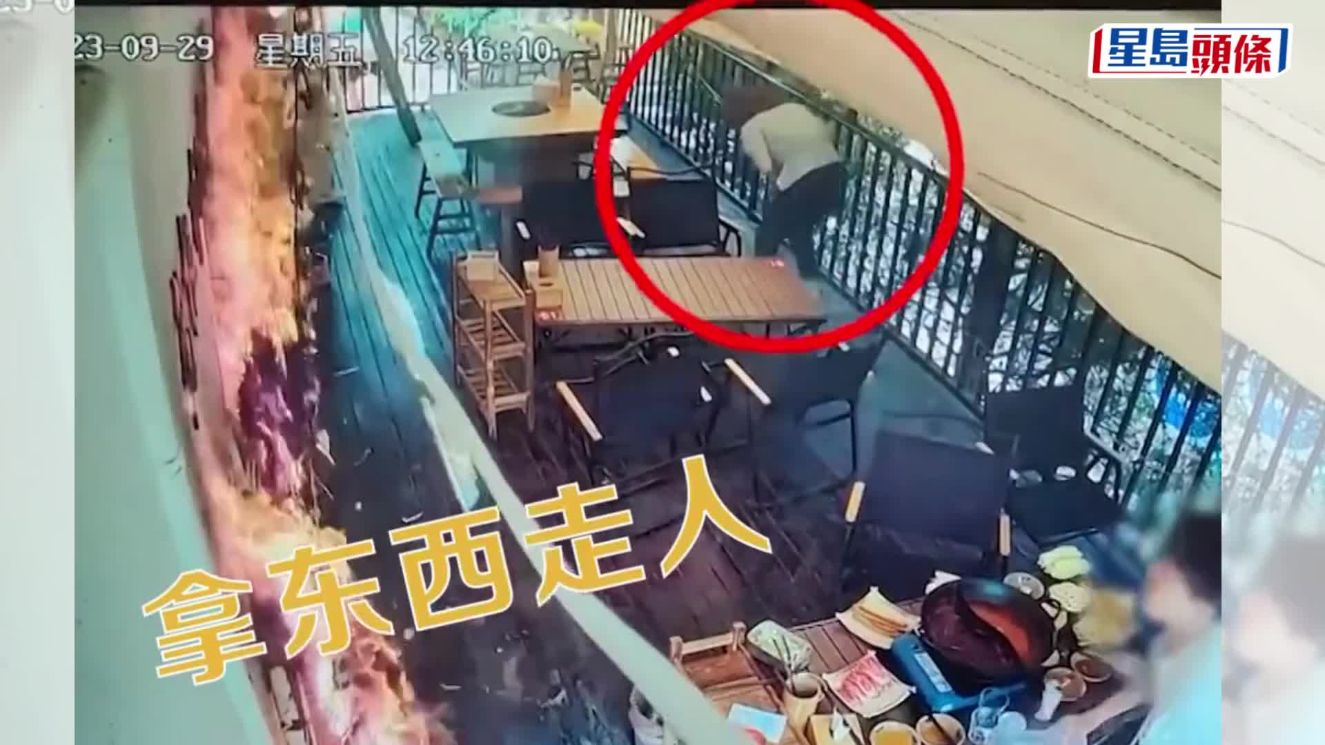 山西女食客突然點燃火鍋店牆上裝飾，引發火災。影片截圖